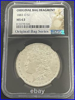 1883-O Morgan Silver Dollar NGC MS 63 Black Core Fragment of Original Mint Bag