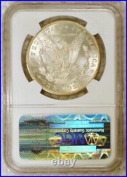 RAINBOW TONED 1884 CC Morgan Silver Dollar Carson City Mint Graded MS64 by NGC